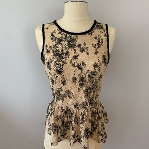 Cream and black lace peplum top